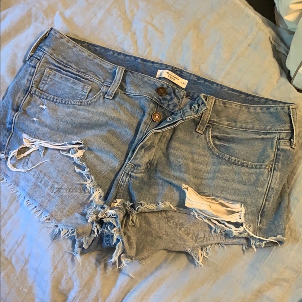 Light washed distressed jean shorts